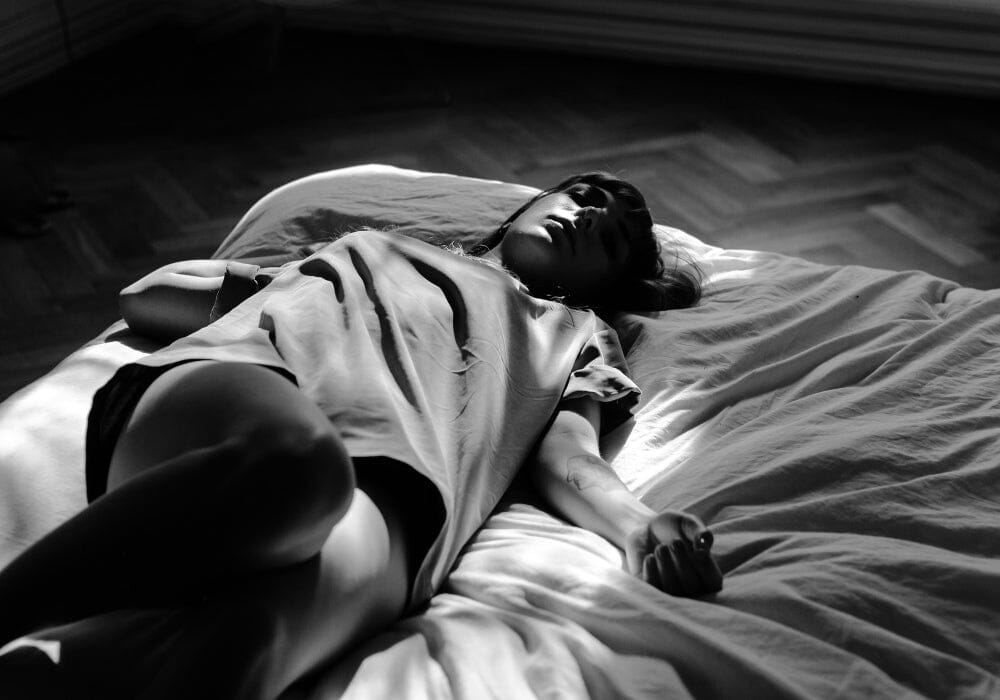 A woman lying in bed